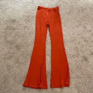 Orange flare pants
